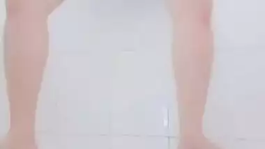 Plump sex symbol from India goes to shower to pee in the nude