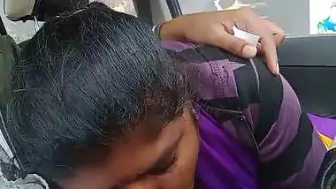 Telugu woman gives a desi blowjob to her man in a car